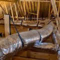 The Connection Between Attic Fans, Roof Longevity, and Structural Health