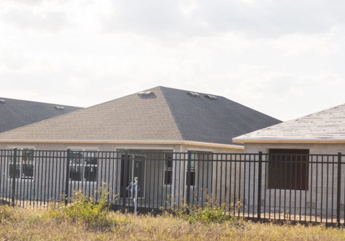 Enhance Your Home with Attic Fans and Expert Fence Building